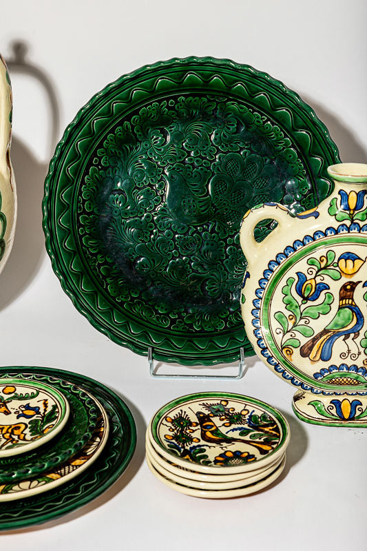 Plates and large green dish