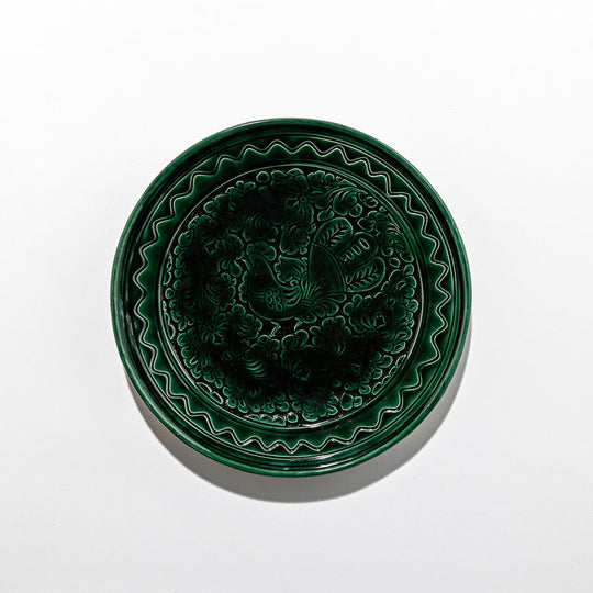 Plates and large green dish