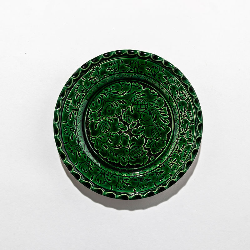 Plates and large green dish