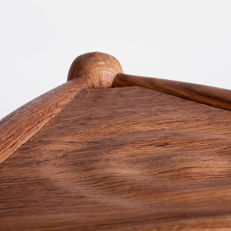 “Tripod” stool in brown oak, brown oak seating
