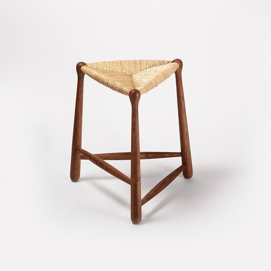 “Tripod” stool in brown oak, straw seating